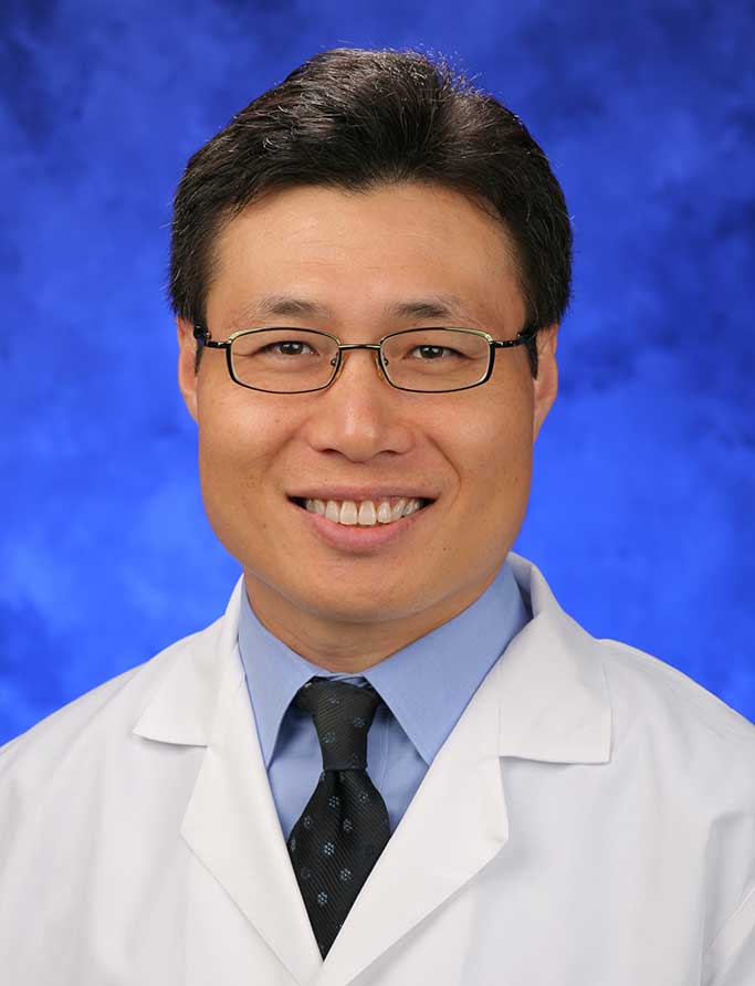 A head-and-shoulders photo of H. Mike Kim, MD