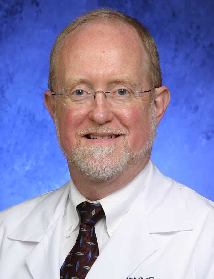 John E. Neely, M.D. John E. Neely, M.D.