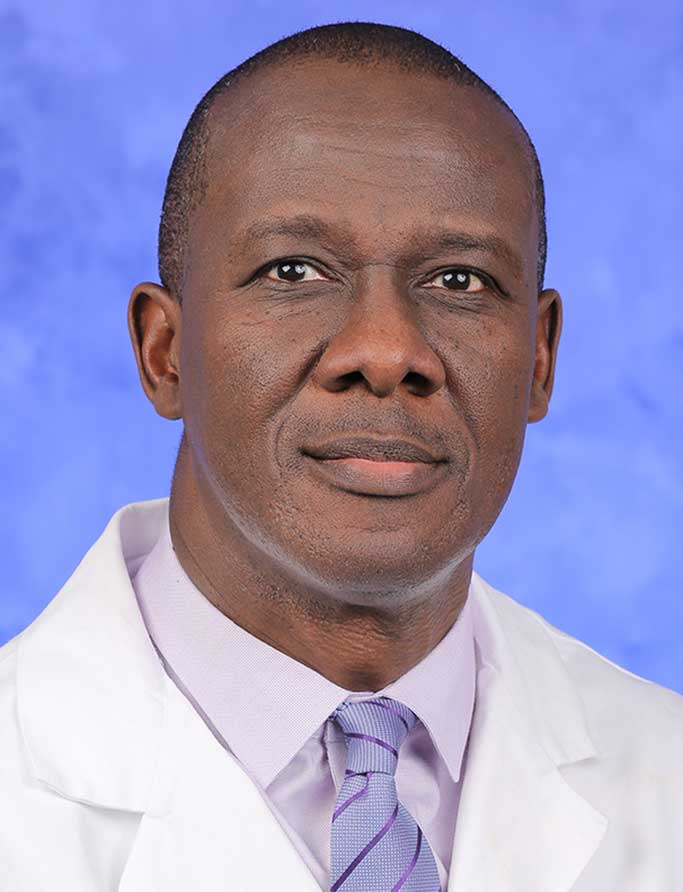 A head-and-shoulders photo of Kofi Clarke, MD, FACP, FRCP (Lond)