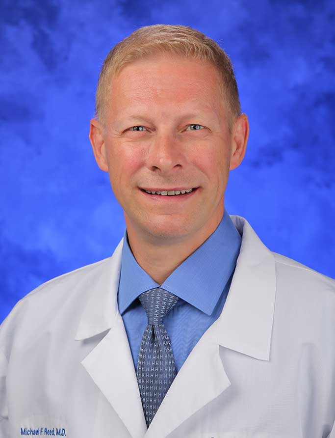 Michael F. Reed, M.D. Michael F. Reed, M.D.