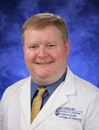 Thomas M. Dunn, M.D. Thomas M. Dunn, M.D.