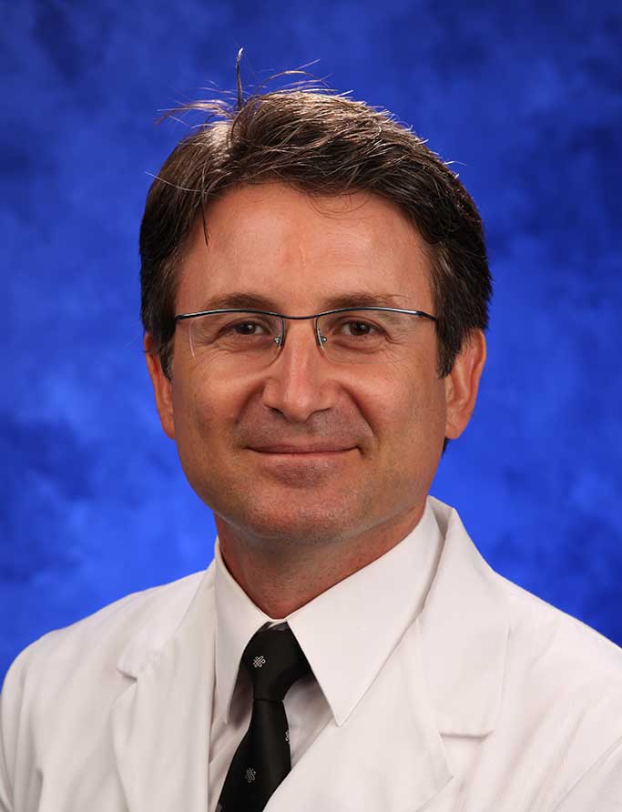 A head-and-shoulders photo of Umar Aydogan, MD