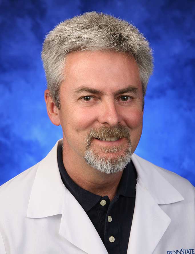 A head-and-shoulders photo of William L. Hennrikus, MD